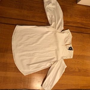 White “cold shoulder” long sleeved blouse